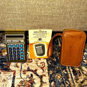 VTG BUNDLE the data brain II calculator, instructional booklet,leather case